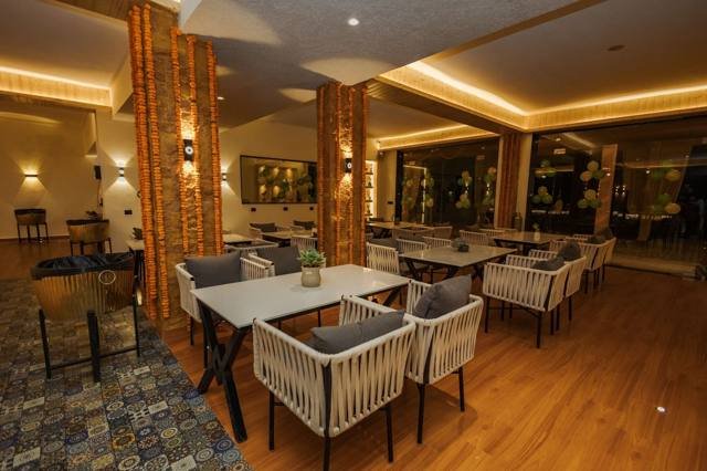 Restaurant with marigold pillars - Parkley Inn Bhimtal