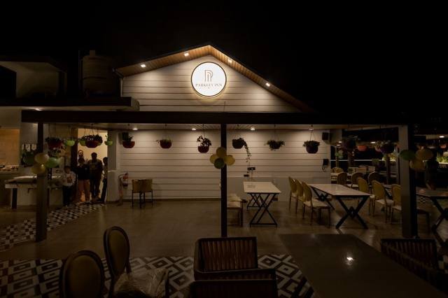 Rooftop cafe at night - Parkley Inn Bhimtal